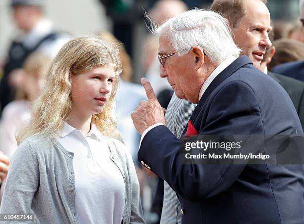 Lady Louise Windsor and her grandfather Christopher Rhys-Jones await the arrival of Sophie, Countess of Wessex at Buckingham Palace where she will...