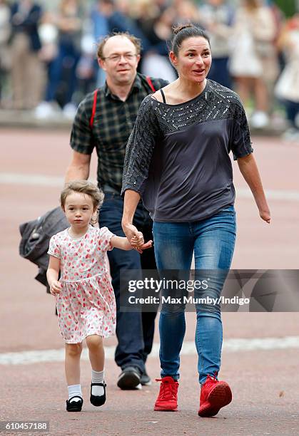 Paralympic gold medalist Dame Sarah Storey, daughter Louisa Marie Storey and husband Barney Storey await the arrival of Sophie, Countess of Wessex at...