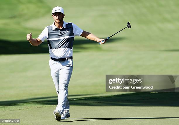 Kevin Chappell celebrates a birdie putt on the 13th hole during the final round of the TOUR Championship at East Lake Golf Club on September 25, 2016...