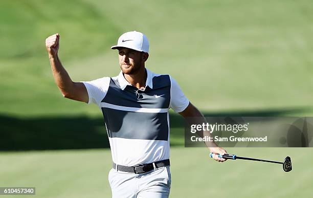 Kevin Chappell celebrates a birdie putt on the 13th hole during the final round of the TOUR Championship at East Lake Golf Club on September 25, 2016...