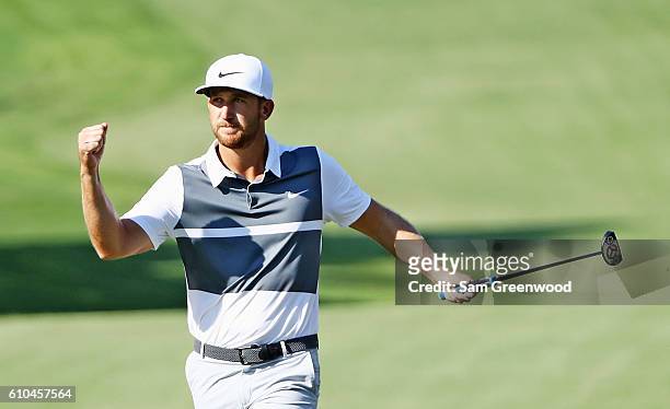 Kevin Chappell celebrates a birdie putt on the 13th hole during the final round of the TOUR Championship at East Lake Golf Club on September 25, 2016...