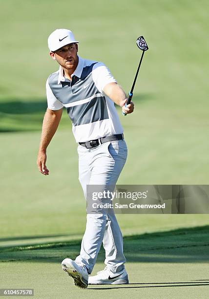 Kevin Chappell celebrates a birdie putt on the 13th hole during the final round of the TOUR Championship at East Lake Golf Club on September 25, 2016...