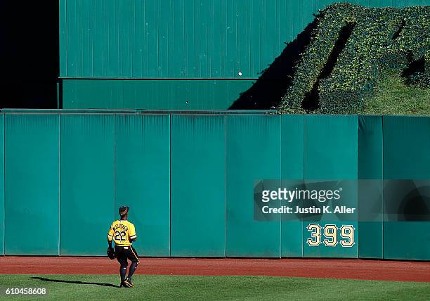 Andrew McCutchen of the Pittsburgh Pirates watches a two run home run go over the fence in the eighth inning during the game against the Washington...