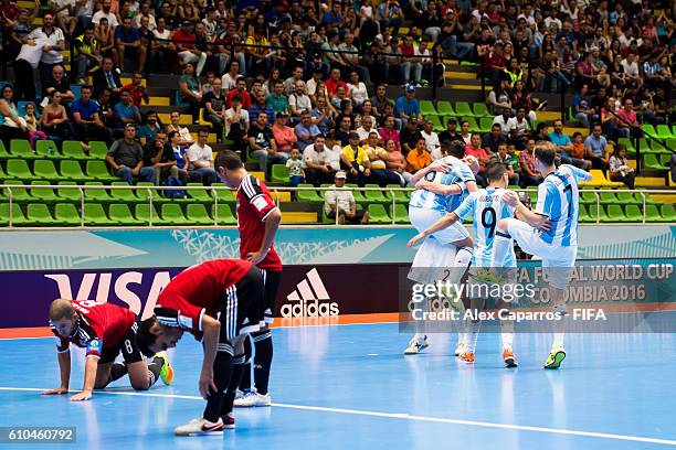 Santiago Basile of Argentina celebrates with his teammates Damian Stazzone , Cristian Borruto and Leandro Cuzzolino after scoring his team's third...