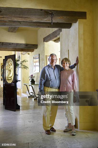 Sanford "Sandy" Weill, former chief executive officer and chairman emeritus of Citigroup Inc., left, and wife Joan Weill, chairman emerita of Alvin...