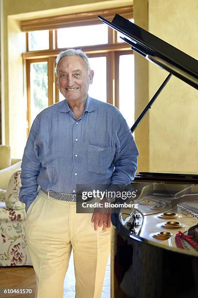 Sanford "Sandy" Weill, former chief executive officer and chairman emeritus of Citigroup Inc., stands for a photograph after an interview at his home...