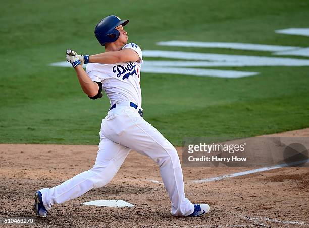 Corey Seager of the Los Angeles Dodgers hits a solo homerun with two outs to tie the score 3-3 during the bottom of the ninth inning against the...