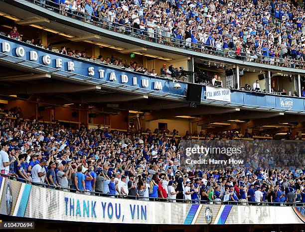 Los Angeles Dodgers announcer Vin Scully and his wife Sandra Hunt acknowedge the crowds applause for his 67 years of service after a 4-3 win over the...