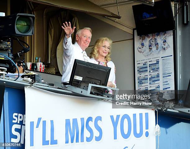 Los Angeles Dodgers announcer Vin Scully and his wife Sandra Hunt acknowedge the crowds applause for his 67 years of service after a 4-3 win over the...