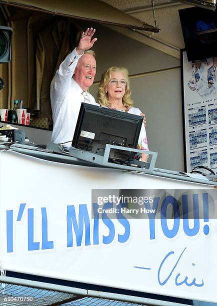 Los Angeles Dodgers announcer Vin Scully and his wife Sandra Hunt acknowedge the crowds applause for his 67 years of service after a 4-3 win over the...