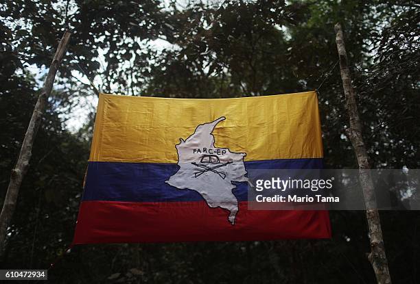 The flag of the FARC hangs following the 10th Guerrilla Conference in the remote Yari plains where the peace accord was ratified by the FARC on...