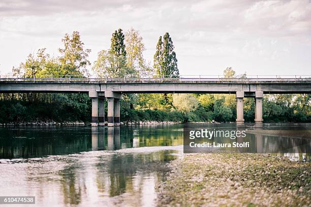 bridge over river and cloudy sky at dusk - bridge of sigh stock pictures, royalty-free photos & images