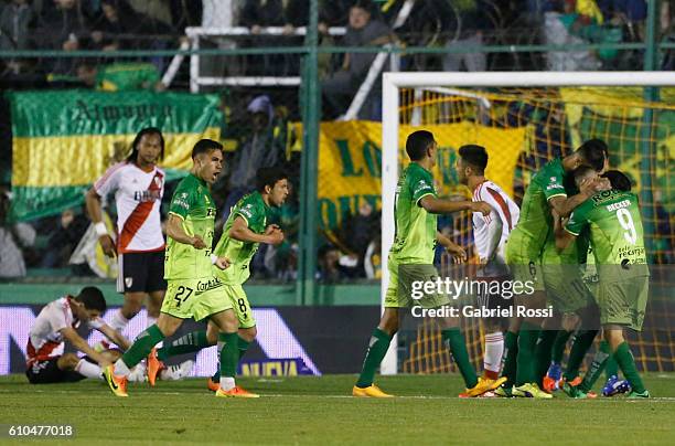 Andres Rios of Defensa y Justicia celebrates with teammates their team's third goal during a match between Defensa y Justicia and River Plate as part...