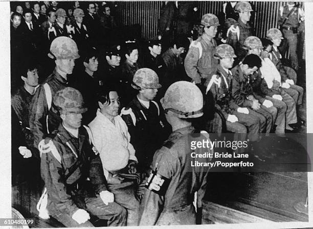 Kim Jae-gyu , former director of the KCIA stands trial with seven others at a military court in Seoul, South Korea, 8th December 1979. They are...