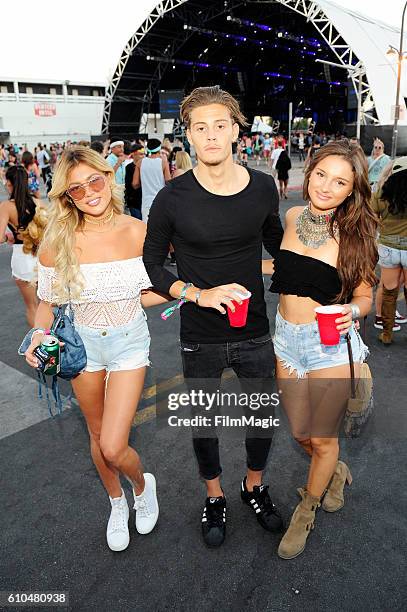 Festival goers pose for a photo while Autograf performs on Troubadour Stage during day 3 of the 2016 Life Is Beautiful festival on September 25, 2016...