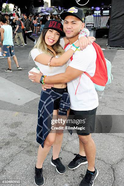 Festival goers pose for a photo while Autograf performs on Troubadour Stage during day 3 of the 2016 Life Is Beautiful festival on September 25, 2016...