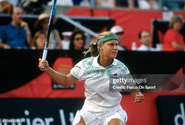 Tennis player Anke Huber of Germany serves during the women 1995 DU Maurier Open Tennis Tournament at the Uniprix Stadium in Montreal, Quebec, Canada.