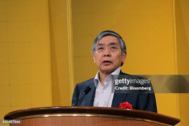 Haruhiko Kuroda, governor of the Bank of Japan , speaks during a business leaders meeting in Osaka, Japan, on Monday, Sept. 26, 2016. The BOJ board...