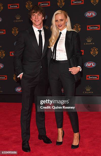 Liam Picken of the Bulldogs and his partner Annie Nolan arrive ahead of the 2016 Brownlow Medal at Crown Entertainment Complex on September 26, 2016...