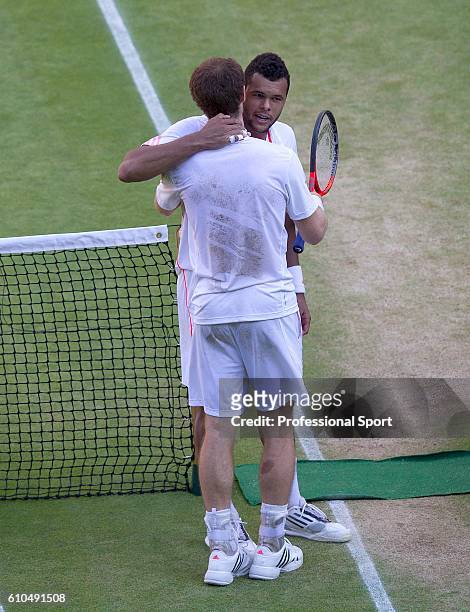 Andy Murray of Great Britain is congratulated by his opponent following his Gentlemen's Singles semi-final victory over Jo-Wilfried Tsonga of France...