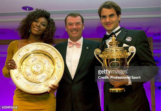 Wimbledon Singles Champions Serena Williams of the USA and Roger Federer of Switzerland pose with Philip Brook, Chairman of the All England Lawn...
