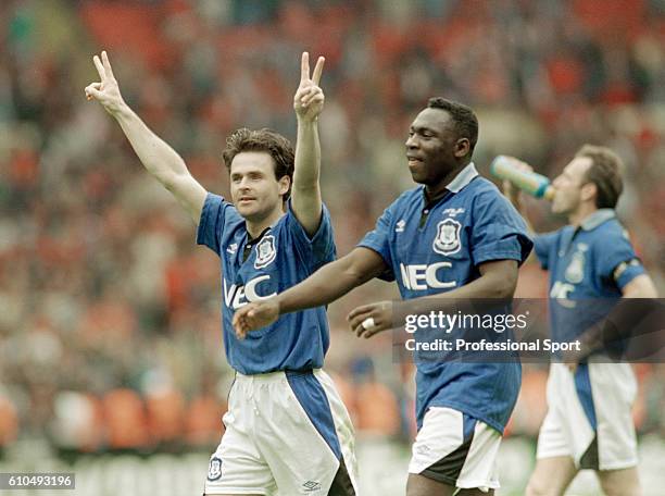 Anders Limpar and Daniel Amokachi celebrate victory after the FA Cup Final between Everton and Manchester United at Wembley Stadium in London, 20th...