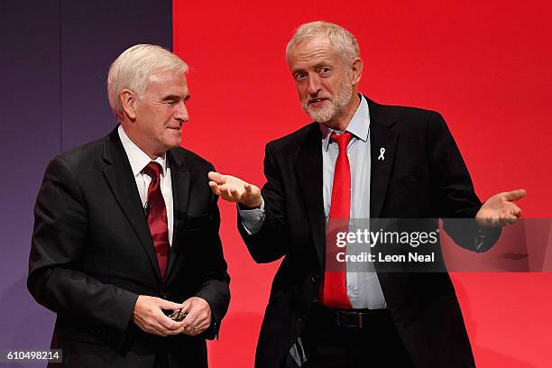 Labour Leader Jeremy Corbyn talks with Shadow Chancellor John McDonnell after the Shadow Chancellor delivered his keynote speech to the Labour Party...