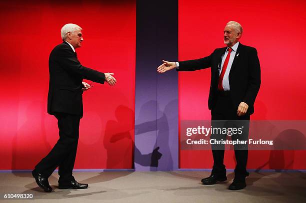 Labour Leader Jeremy Corbyn congratulates Shadow Chancellor John McDonnell after the Shadow Chancellor delivered his keynote speech to the Labour...