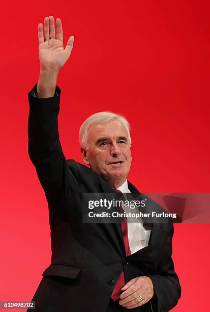 Shadow Chancellor John McDonnell acknowledges conference after his keynote speech to the Labour Party Conference on September 26, 2016 in Liverpool,...