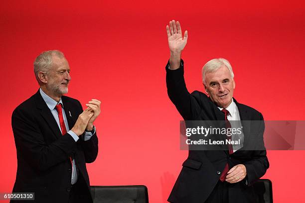 Shadow Chancellor John McDonnell is congratulated by the Labour Party leader Jeremy Corbyn following his keynote speech on the second day of the...