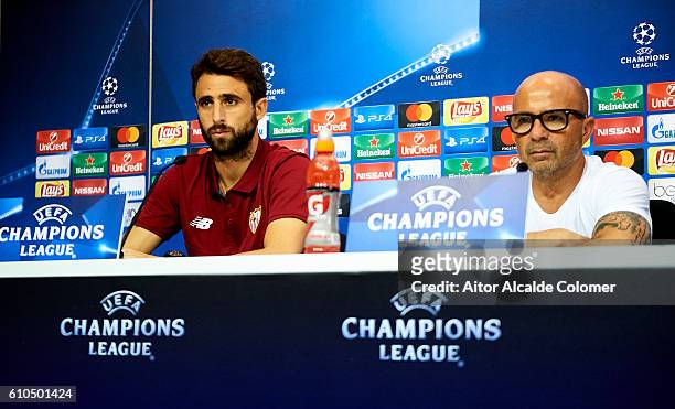 Nicolas Pareja of Sevilla FC and head Coach of Sevilla FC Jorge Sampaoli attends to the press during the press conference prior to their match of...