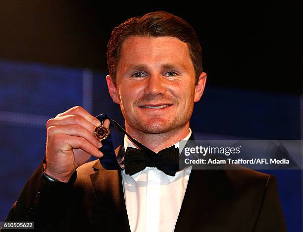Patrick Dangerfield of the Cats holds the 2016 Brownlow Medal during the 2016 Brownlow Medal Count at the Crown Palladium on September 26, 2016 in...