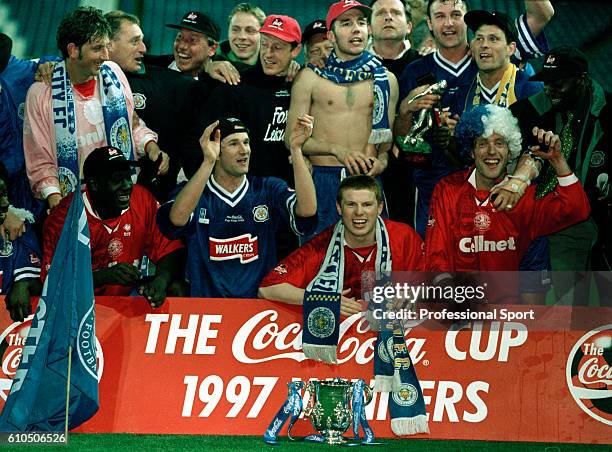 Leicester City celebrate with the trophy after the Coca Cola League Cup Final Replay between Leicester City and Middlesbrough at Hillsborough in...