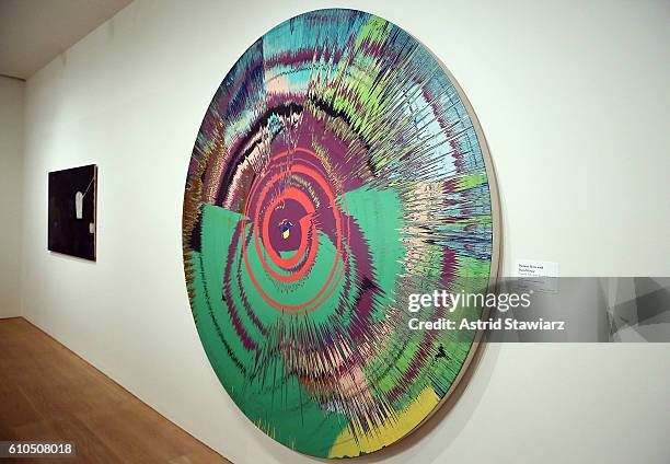 Damien Hirst painting titled 'Beautiful, shattering, slashing, violent, pinky, hacking, sphincter ' 1995, is displayed during the David Bowie...