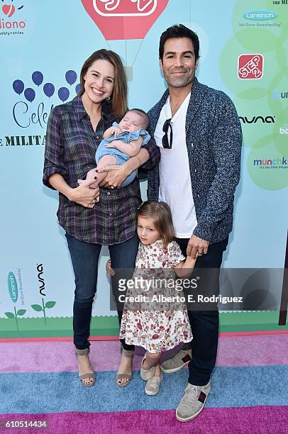 Actress Kaitlin Riley and actor Jordi Vilasuso attend the Step2 & Favored.by Present The 5th Annual Red Carpet Safety Awareness Event at Sony...