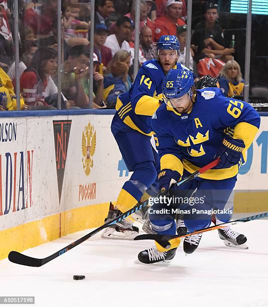 Erik Karlsson of Team Sweden stickhandles the puck against Team Finland during the World Cup of Hockey 2016 at Air Canada Centre on September 20,...
