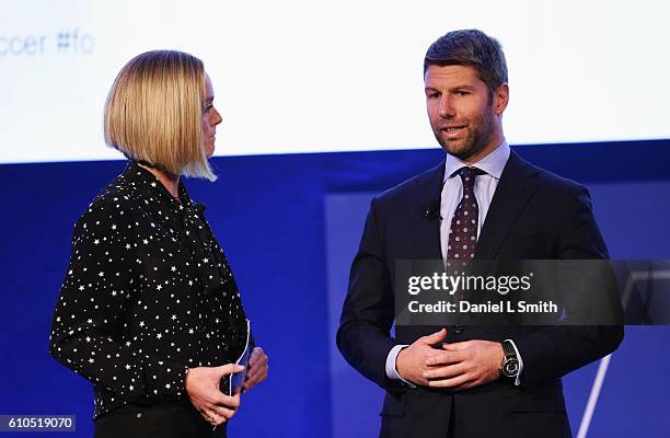 Amanda Davies , CNN International Sports presenter talks with Thomas Hitzlsperger, former German International during the presentation of the...