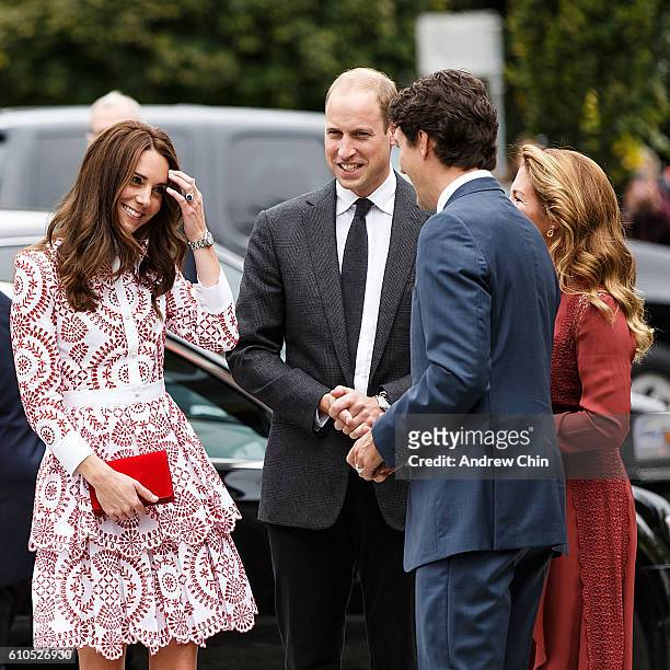 Catherine, Duchess of Cambridge and Prince William, Duke of Cambridge arrive at Immigrant Services Society of BC on September 25, 2016 in Vancouver,...