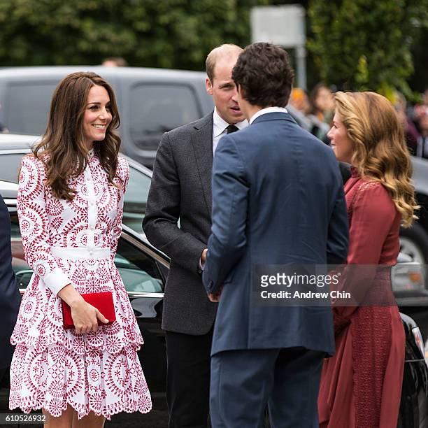 Catherine, Duchess of Cambridge and Prince William, Duke of Cambridge arrive at Immigrant Services Society of BC on September 25, 2016 in Vancouver,...