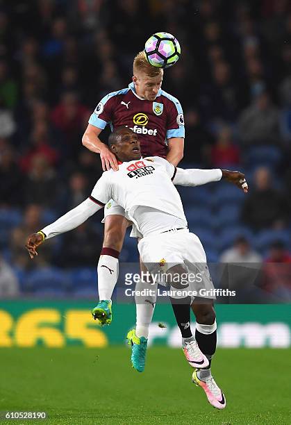 Odion Ighalo of Watford and Ben Mee of Burnley battle for possesion during the Premier League match between Burnley and Watford at Turf Moor on...