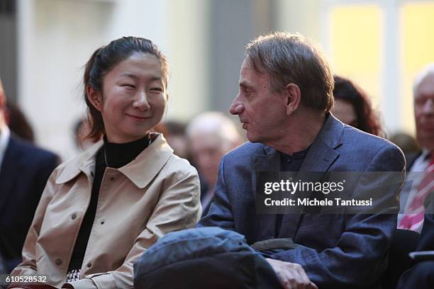 Author Michel Houellebecq sits next to Li Qianyun during the Frank Schirrmacher award ceremony on September 26, 2016 in Berlin, Germany.