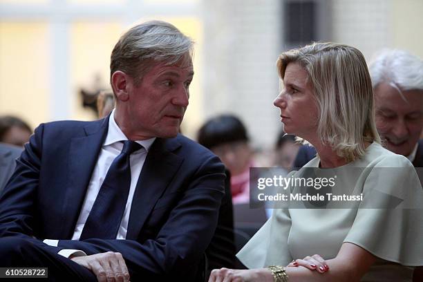 Matthias Doepfner and Ulrike Doepfner sit together during the Frank Schirrmacher award ceremony on September 26, 2016 in Berlin, Germany.