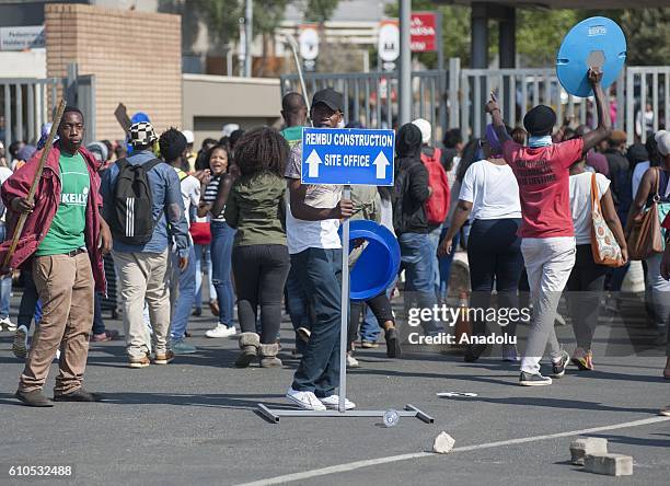 Students gather to protest after South African Minister of Higher Education and Training Blade Nzimande's explanations on possibility of raising...