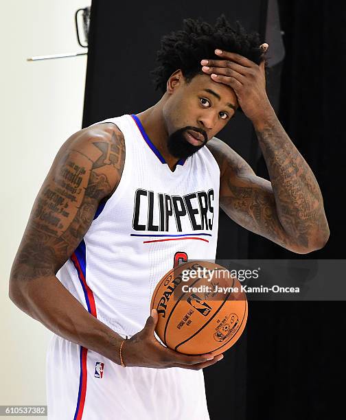 DeAndre Jordan of the Los Angeles Clippers films B roll for Fox Sports during media day at the Los Angeles Clippers Training Center on September 26,...