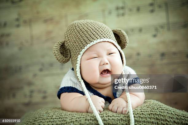 overweight baby crying - chubby girls stock pictures, royalty-free photos & images