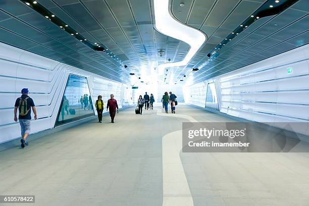 modern underground subway with passengers and travellers sydney australia - barangaroo stock pictures, royalty-free photos & images