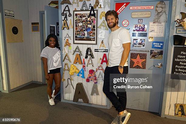 Olympic gold medal gymnast Simone Biles visits the set of 'Pretty Little Liars.'" SIMONE BILES, KEEGAN ALLEN