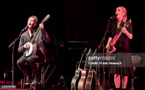 Singer Helgi Jonsson and Tina Dico perform live during a concert at the Admiralspalast Studio on September 26, 2016 in Berlin, Germany.