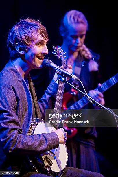 Singer Helgi Jonsson and Tina Dico perform live during a concert at the Admiralspalast Studio on September 26, 2016 in Berlin, Germany.