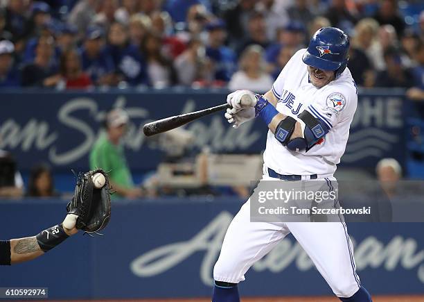 Josh Donaldson of the Toronto Blue Jays is hit by pitch in the first inning during MLB game action against the New York Yankees on September 26, 2016...